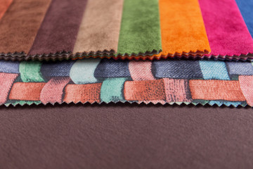 Different colors of the fabric palette for tightening furniture in the interior