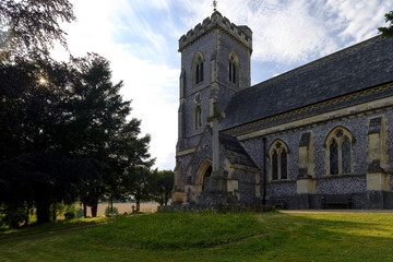 Fototapeta na wymiar Summer view of St James the Evangelist Church, West Meon in the Meon Vally in the South Downs National Park, Hampshire, UK