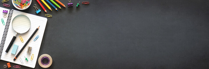 Back to School Concept with Stationery Supplies and Blackboard