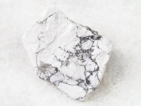 raw Howlite stone on white