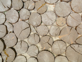 Cobbled with wood, a road or a path. Natural background. Copy space.