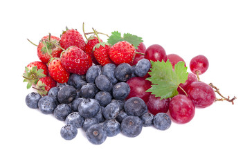 Mix of ripe sweet fruits and berries isolated on white
