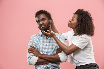 Couple watching sports match on tv at home, celebrating victory, successful game