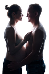 Pregnant girl and guy on white background