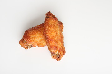 wings of chicken deep fried on white background