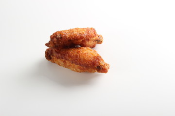 wings of chicken deep fried on white background