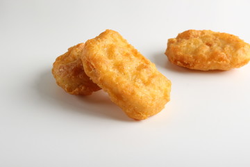 nuggets chicken deep fried on white background