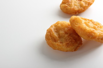 nuggets chicken deep fried on white background