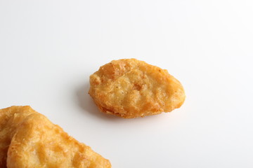 nuggets chicken deep fried on white background