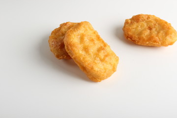 nuggets chicken deep fried on white background