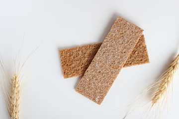 rye cpispbread on a white background