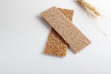 rye cpispbread on a white background