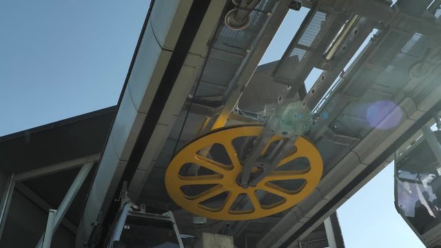 4 k funicular cableway in Monjuic Barcelona, driving cabines, mechanical gear metal wheels