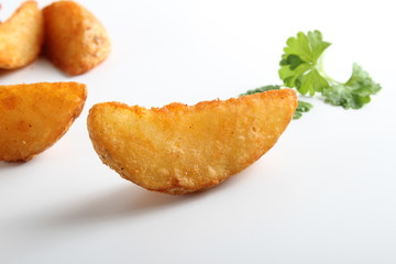 country slices potatoes on white background