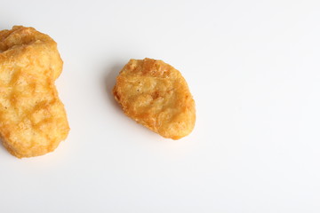 nuggets chicken deep fried on white background