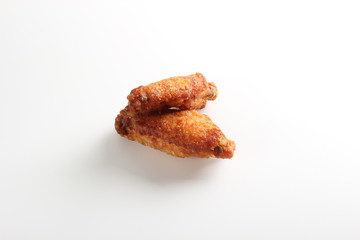 wings of chicken deep fried on white background