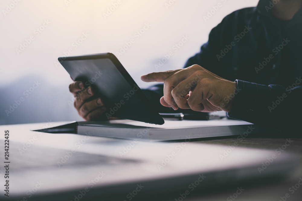 Poster professional at work, businessman using tablet working analysis investment connection at modern work