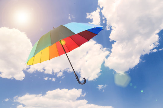 Umbrella and cloudy sky, Concept photography