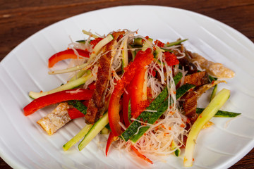 Asian salad with salmon skin
