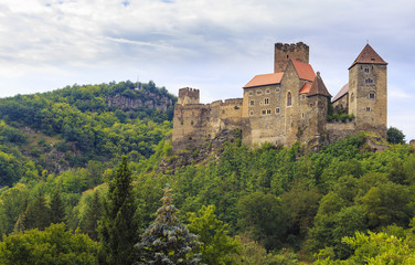 Fototapeta na wymiar Landscape with Hardegg Castle in Lower Austria near Czech Republic border in cloudy day