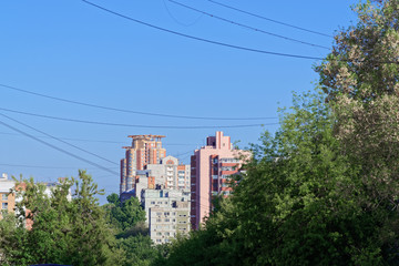 Obraz premium Scene of distant skyscrapers against clear blue sky in Khabarovsk, Russia
