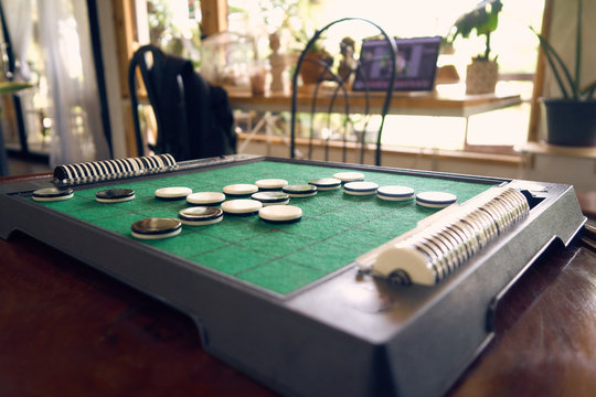 Othello Strategy Game Builds on the ability to plan. To win the opponent. using as background business direction, planning and Strategy concept. vintage tone.