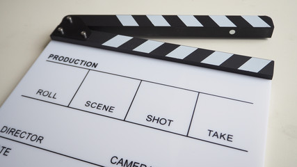 Fototapeta na wymiar Clapper or slate use in video production or movie and cinema industry. It's white color on white background.