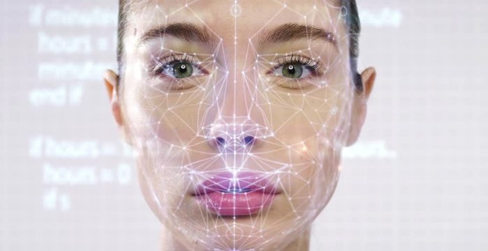 Futuristic and technological scanning of the face of a beautiful woman for facial recognition and scanned person. It can serve to ensure personal safety. Concept of:  future, security, scanning.