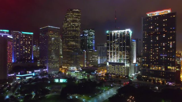 MIAMI - FEBRUARY 2016: City skyline at night from the air. The city attracts 20 million people every year