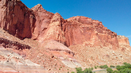 Fototapeta premium Aerial view of beautiful canyon with red mountains