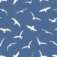 seamless pattern with gulls on blue background