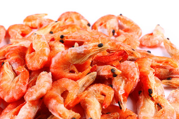 Frozen fresh shrimp on white background (isolated). Snack to beer. Close up