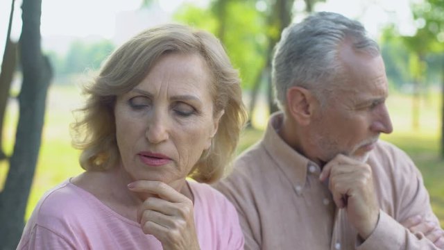 Elderly couple quarrelling over mans cheating, crisis in relations, divorce