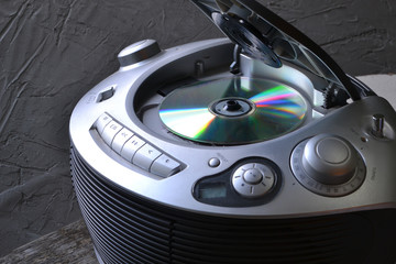 CD player with an open lid.