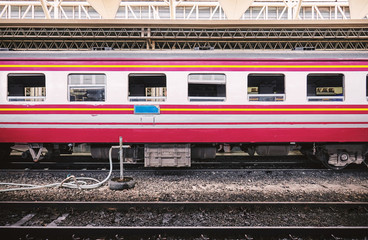 Side view of train bogies parking at the platform for maintenance services