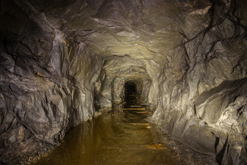 Underground abandoned ore mine shaft tunnel gallery