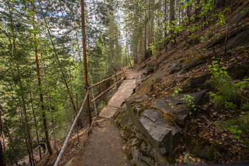 Abandoned ore mica mine quarry open pit in forest