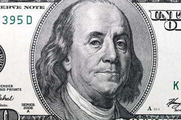 Dollars closeup. Benjamin Franklin's portrait on a  bill.Concept of money and earnings.