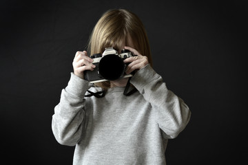 Young Girl Photographer Taking Photograph with Camera