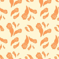 Seamless pattern of orange carrot on the yellow bakcground