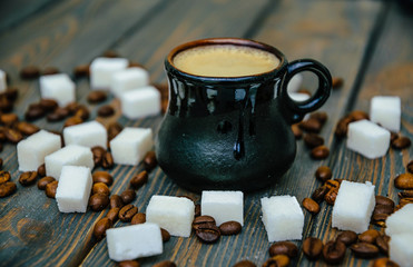 Hot coffee, refined sugar and coffee beans