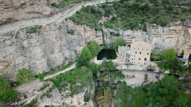 View from drone on waterfall on Sant Miquel del Fai in the Spain.