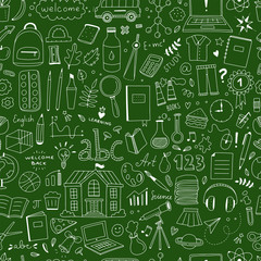 School seamless pattern on the green chalkboard. Cute school elements and icons background
