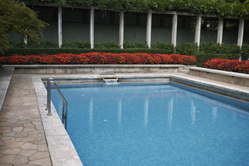 Milan, Italy - July 12, 2018 : View of Villa Necchi Campiglio swimming pool by Piero Portaluppi