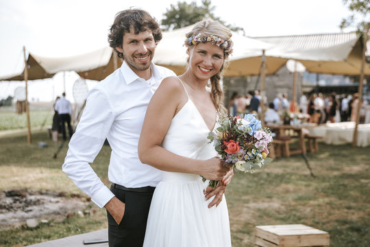 bride and groom on outdoor boho wedding