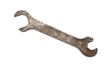 Old wrench isolated on white background.