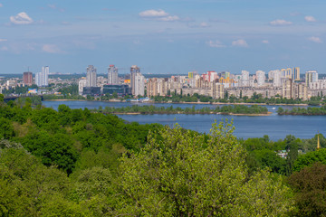 sleeping area of the high-rise buildings of the big metropolis on the river bank