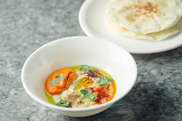 hummus with baked peppers and tortillas