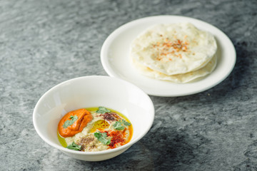 hummus with baked peppers and tortillas