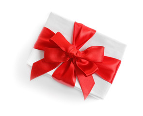 Beautifully wrapped gift box on white background, top view